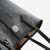 Close up of black bag, showing texture of the fabric
