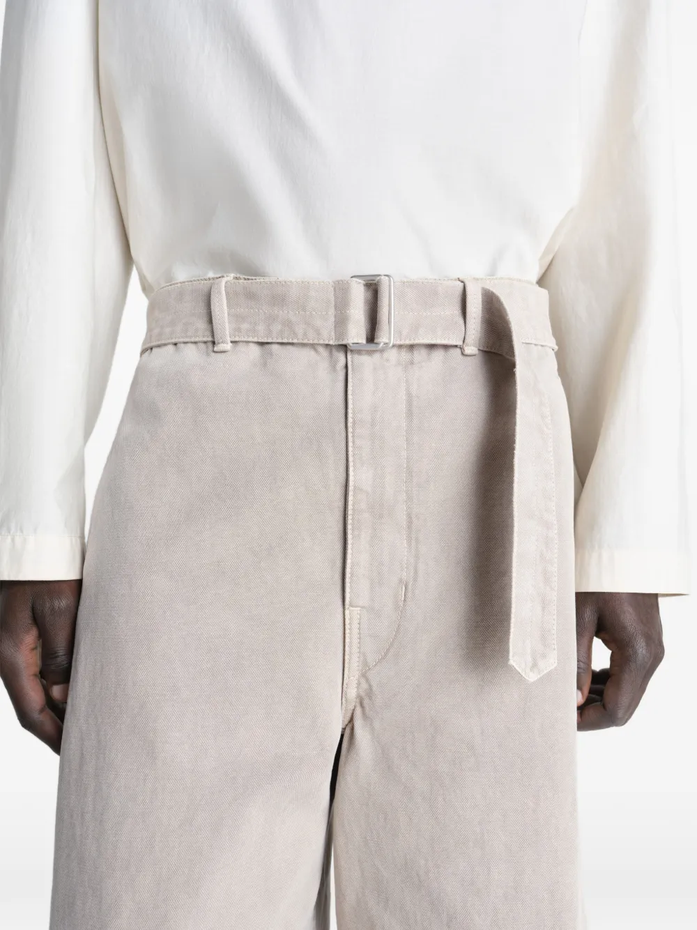 Close up of beige wide-leg pant,showing texture of the cotton fabric