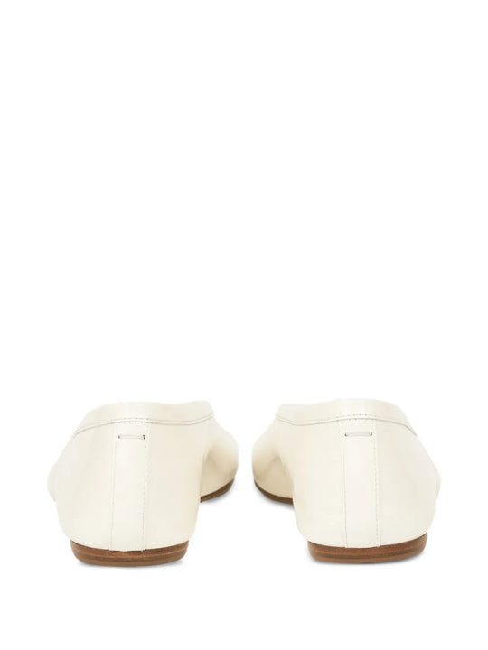 White shoes, back view