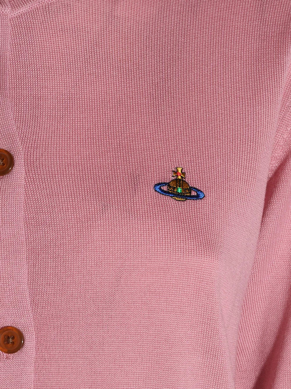 Close up of Pink knitwear, showing texture of the 100% wool fabric