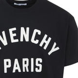 Close up of black t-shirts, showing texture of the cotton fabric