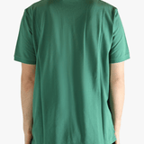 Green t-shirt  worn by a person, showing the t-shirt's fit