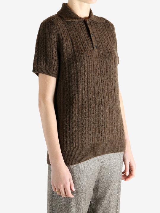 Brown knitwear worn by a person, showing the knitwear fit