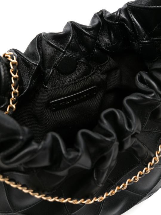 Close up of black bag, showing texture of the leather fabric