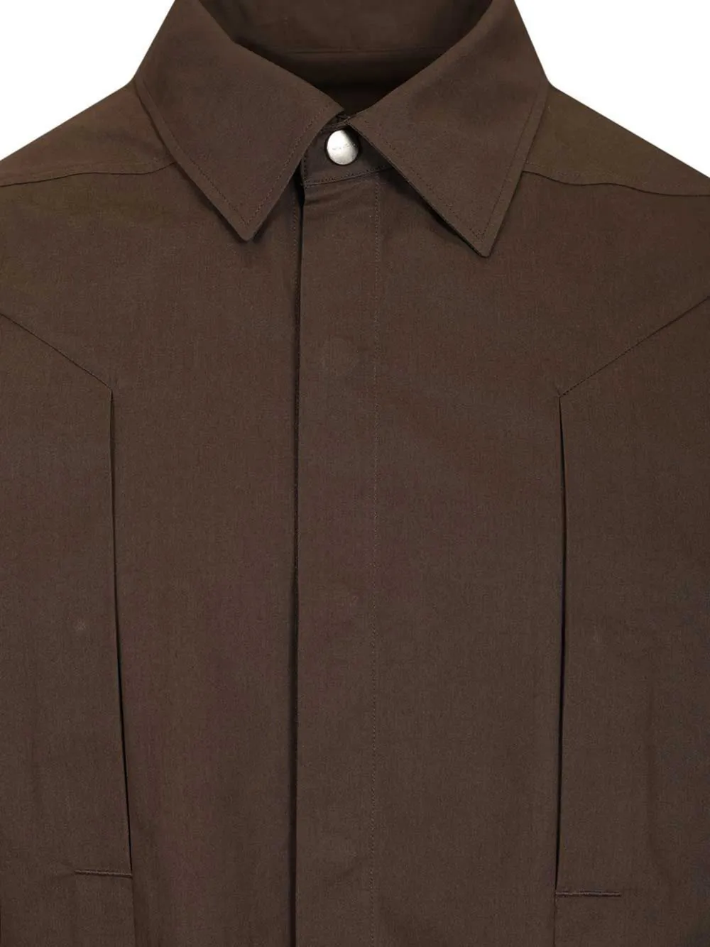 Close up of Brown jacket, showing texture of the 100% cotton fabric