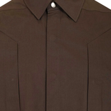 Close up of Brown jacket, showing texture of the 100% cotton fabric