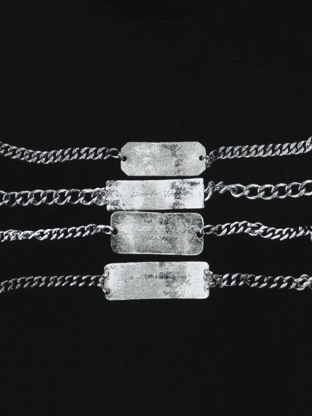 Close up of black t-shirt, showing texture of the Cotton fabric