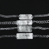 Close up of black t-shirt, showing texture of the Cotton fabric