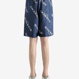 Navy short worn by a person, showing the short fit