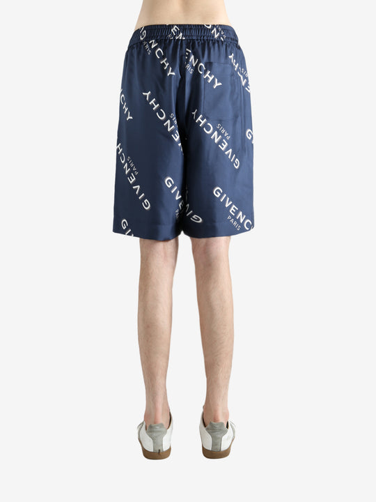 Navy short worn by a person, showing the short fit