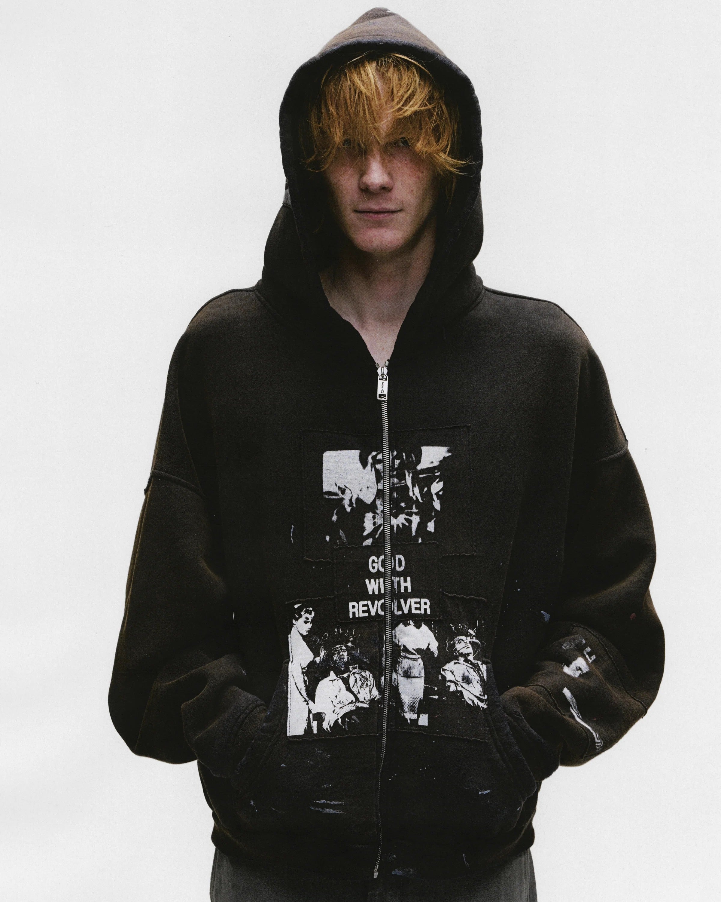 Black hoodie worn by a person, showing the hoodie