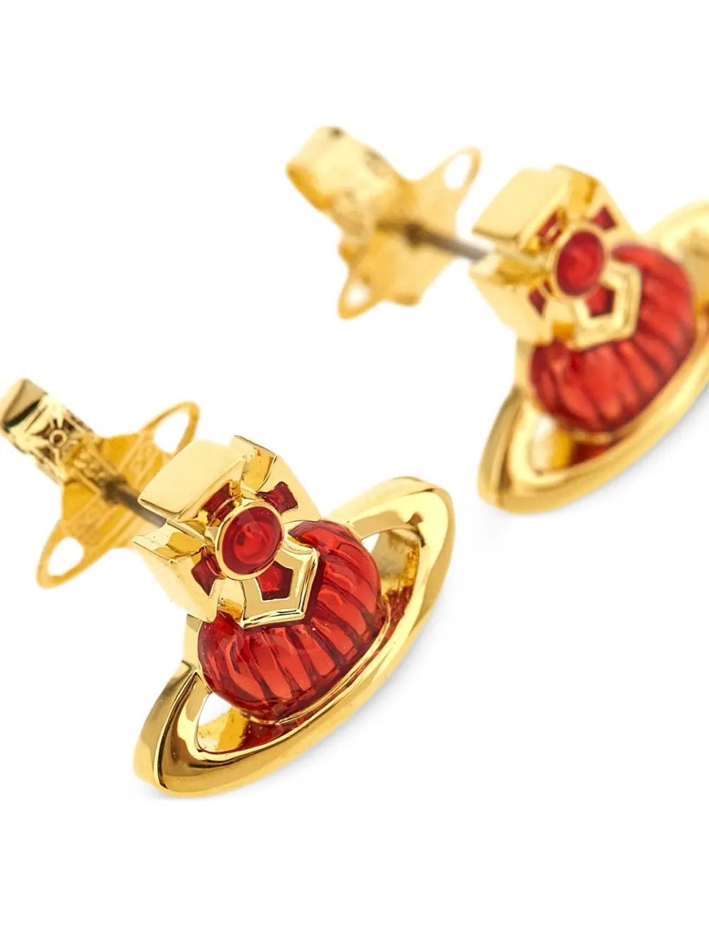 Close up of Yellow earrings, showing texture of the brass fabric
