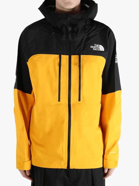 Yellow jacket worn by a person, showing the jacket's fit