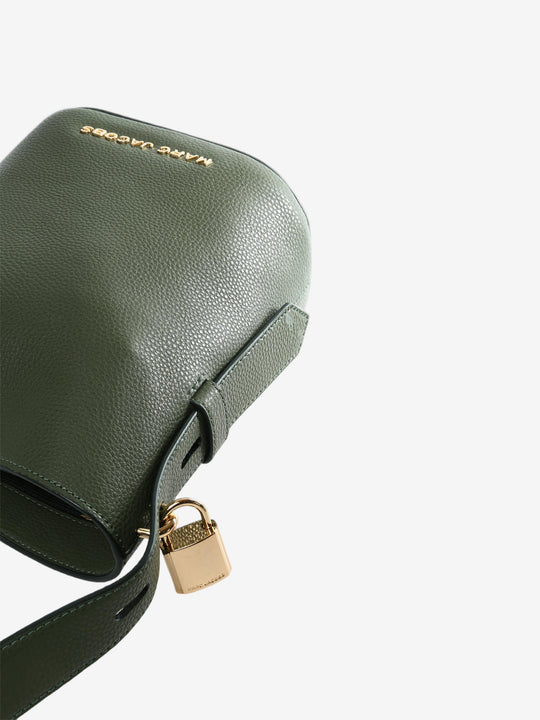 Close up of green bag, showing texture of the cow leather fabric