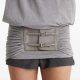 Grey top worn by a person, showing the top fit