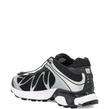 black sneakers, side view