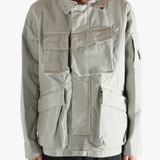 Grey jacket worn by a person, showing the jacket fit