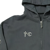 Close up of grey sweats , showing texture of the cowhide and cotton fabric