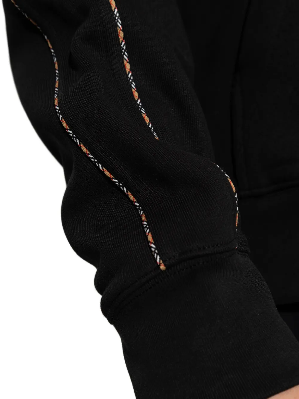 Close up of the black hoodies, showing texture of the cotton