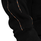 Close up of the black hoodies, showing texture of the cotton