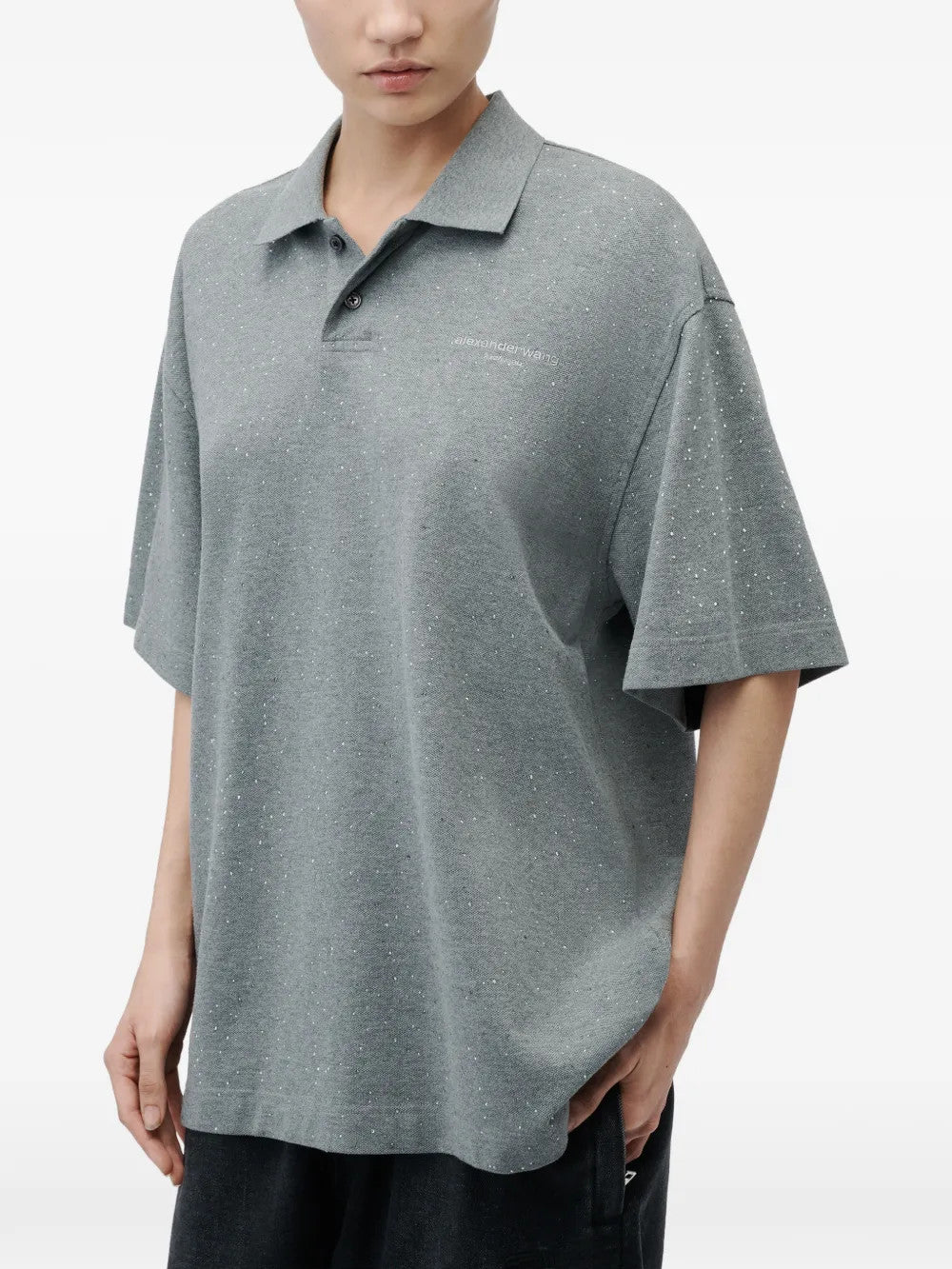 Grey t-shirt worn by a person, showing the t-shirt fit