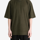 Green top, full body view