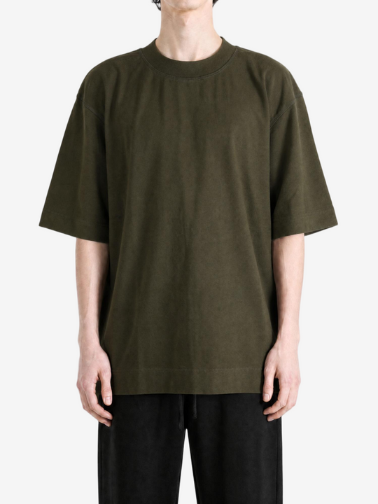 Green top, full body view