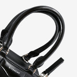 Close up of the black bag, showing texture of the calf leather fabric