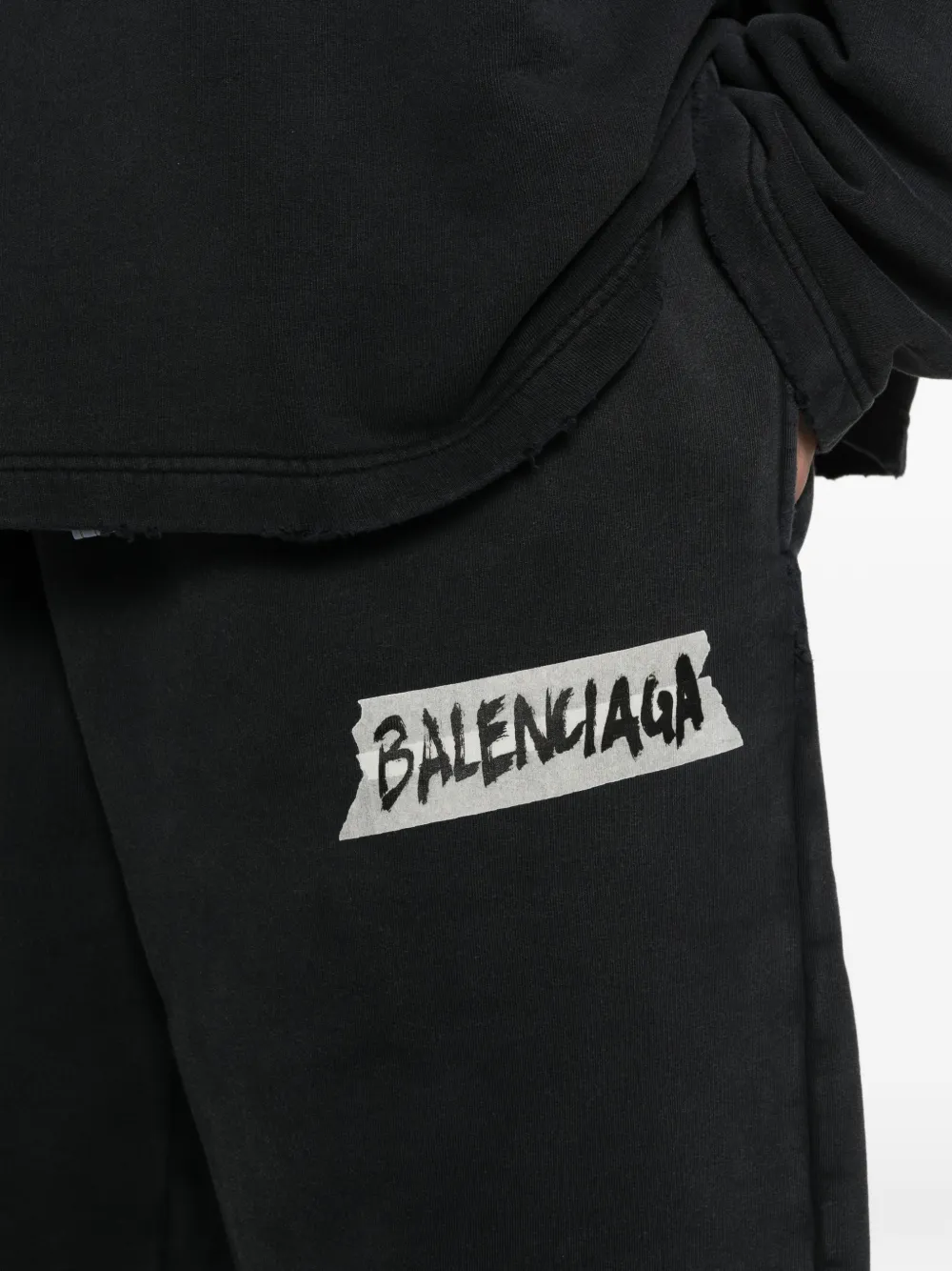 Close up of black pants, showing texture of the Cotton fabric