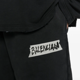 Close up of black pants, showing texture of the Cotton fabric