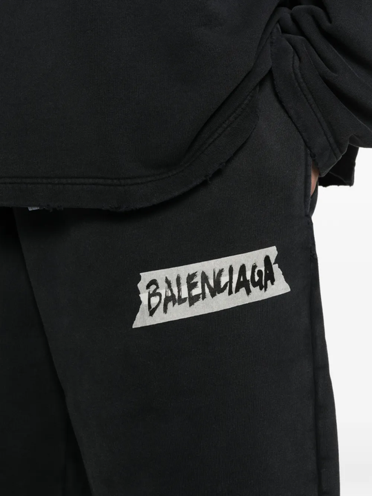 Close up of black pants, showing texture of the Cotton fabric