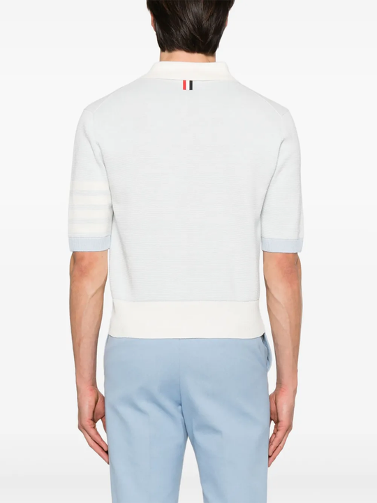 White t-shirt worn by a person, showing the t-shirt fit