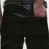 Close up of Black pants, showing texture of the cotton fabric