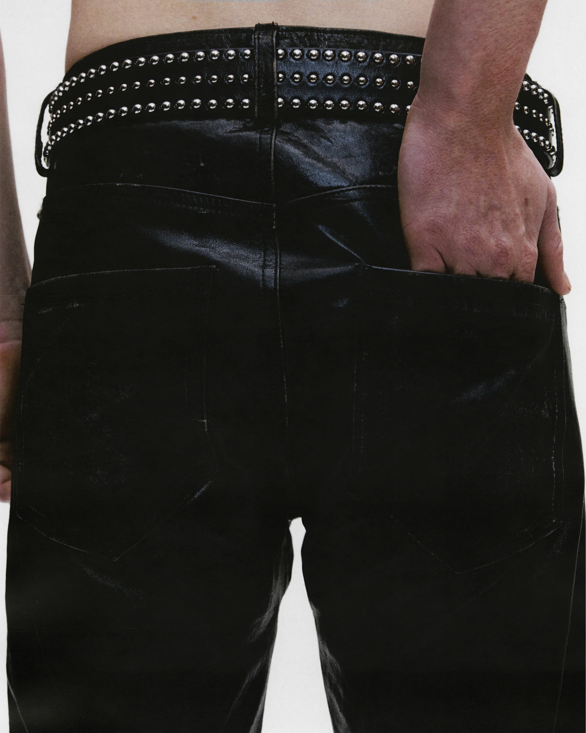 Close up of Black pants, showing texture of the cotton fabric