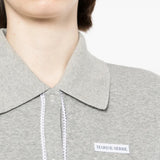 Grey t-shirt worn by a person, showing the t-shirt fit