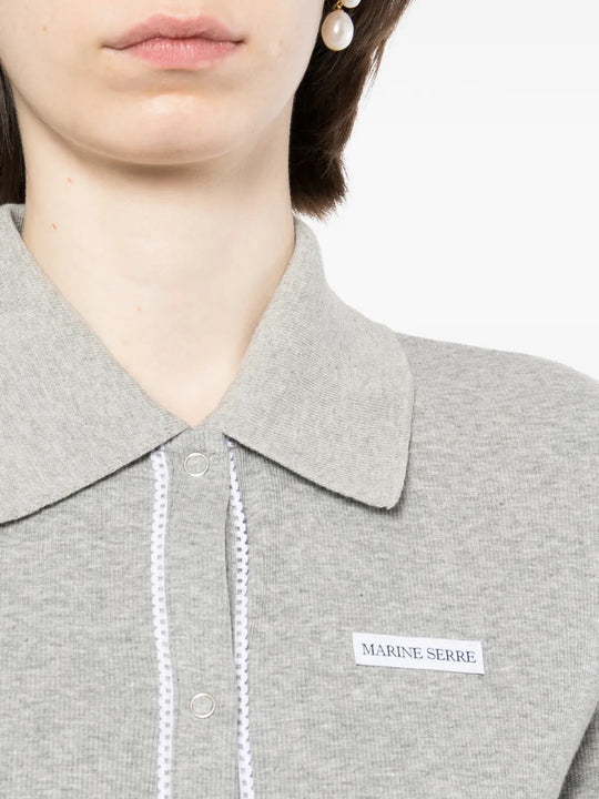 Grey t-shirt worn by a person, showing the t-shirt fit