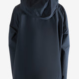 Navy jacket worn by a person, showing the jacket's fit