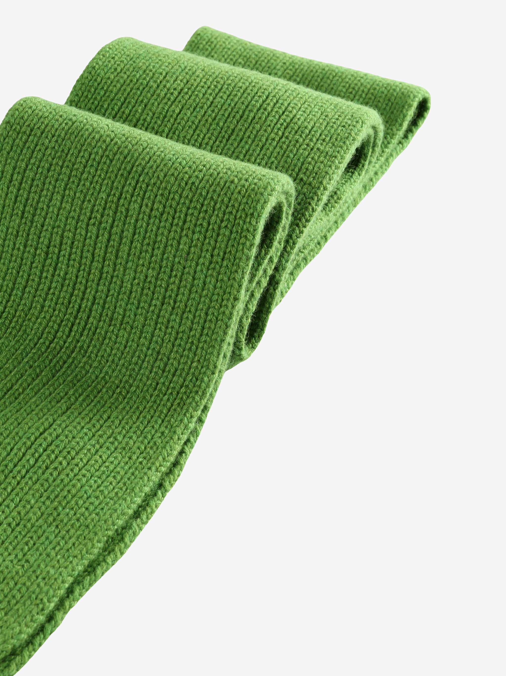 Close up of the green scarf, showing texture of the wool fabric