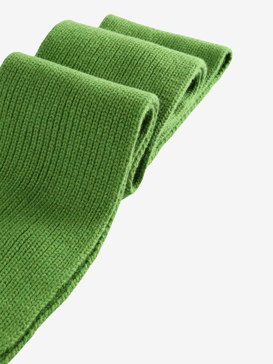 Close up of the green scarf, showing texture of the wool fabric