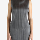 Grey shirts worn by a person, showing the shirts fit