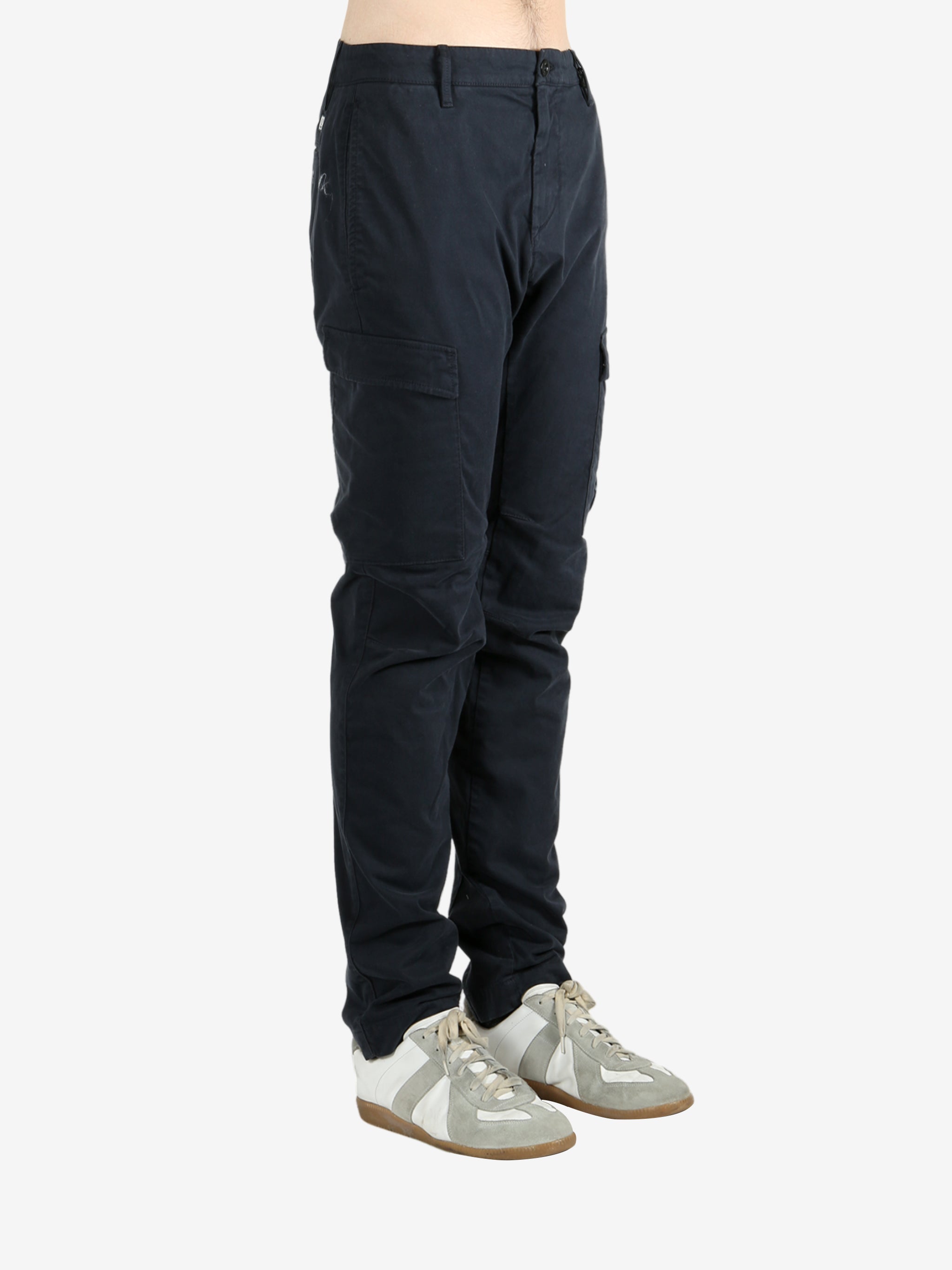 Blue pants worn by a person, showing the pants fit