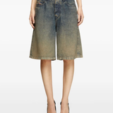 Blue shorts worn by a person, showing the short's fit