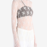 Tan top worn by a person, showing the top fit