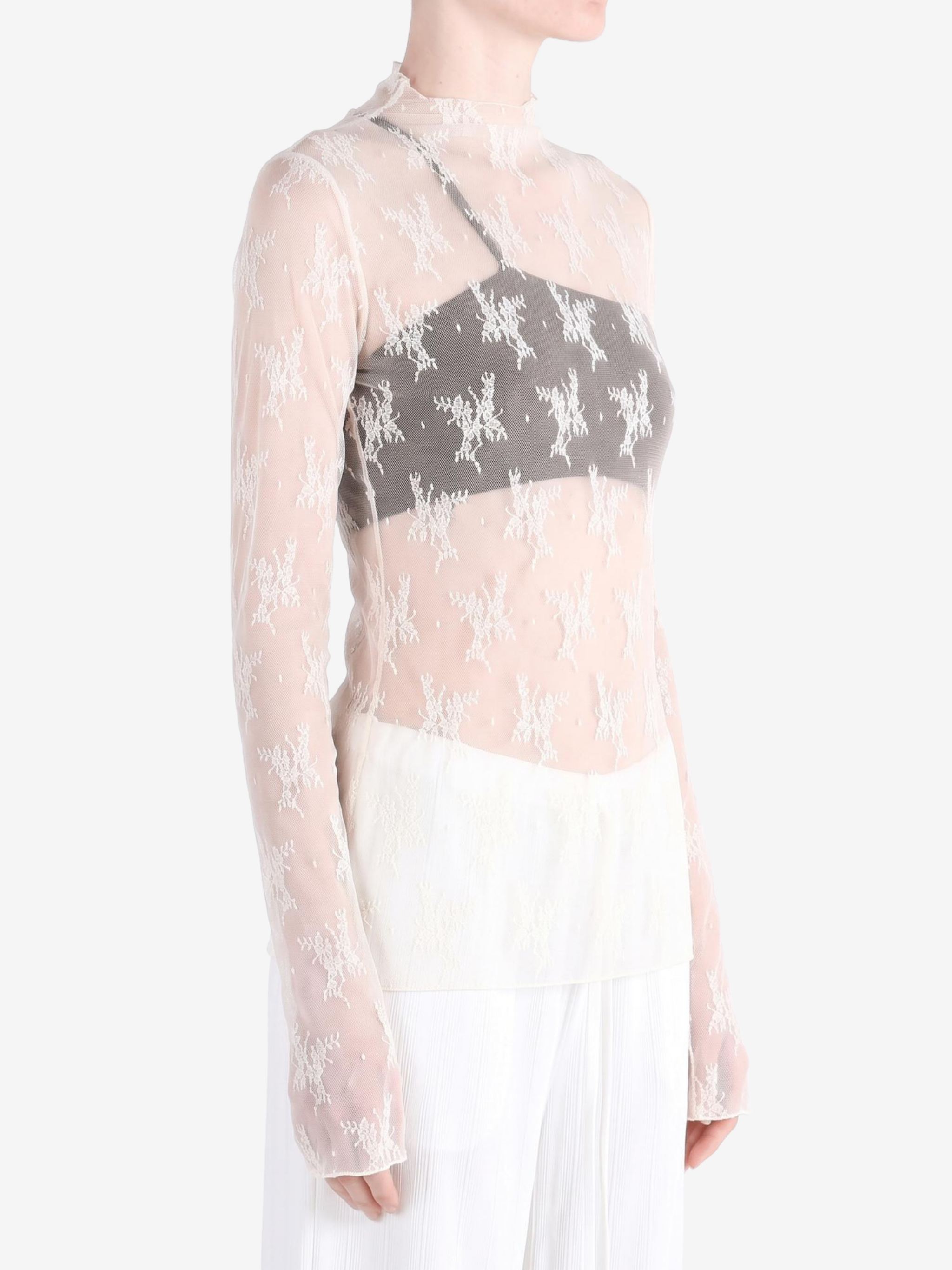 Tan top worn by a person, showing the top fit