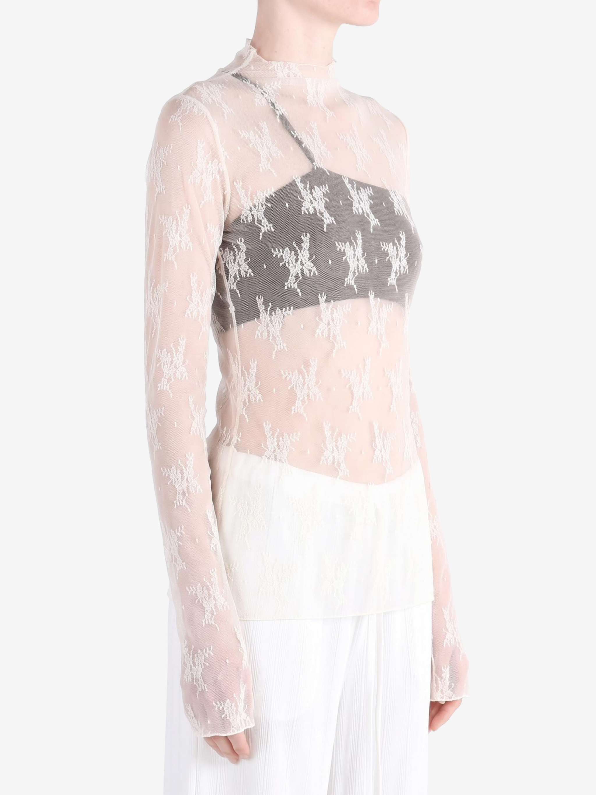 Tan top worn by a person, showing the top fit