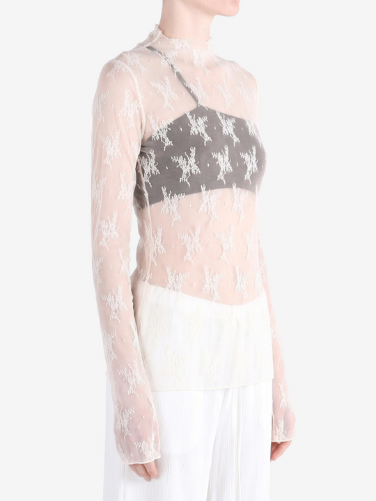 Tan top worn by a person, showing the top fit