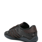 Black sneaker, back view