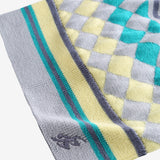 Close up of grey hat, showing texture of the wool fabric