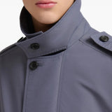 Grey jacket worn by a person, showing the jacket fit