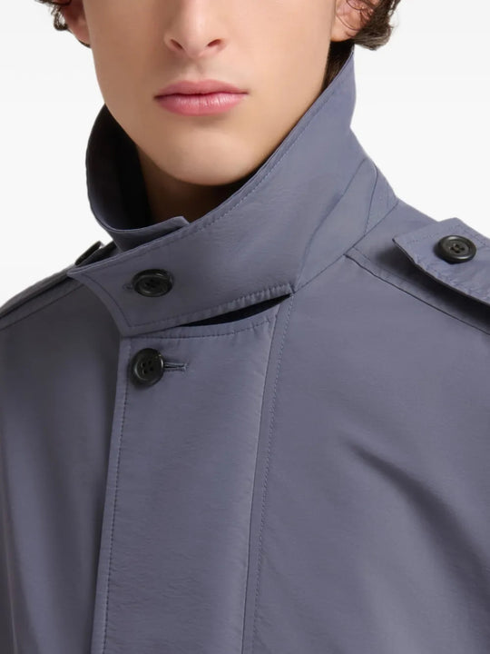 Grey jacket worn by a person, showing the jacket fit